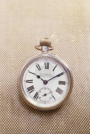 Photo for Vintage old silver, T. Harris Swiss made pocket watch, India, Asia - Royalty Free Image