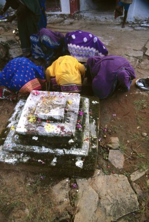 Photo for Hindu women bowing infront of deity, madhya pradesh, india - Royalty Free Image