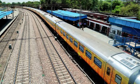 Photo for Tejas Express, air-conditioned train, Indian Railways, Safadarajng Railway station, New Delhi, India, 19 May 2017 - Royalty Free Image