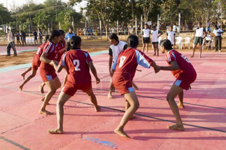 Photo for Women playing kabaddi on ground, Tamil Nadu, India - Royalty Free Image