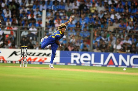 Photo for Sri Lankan bowler Lasith Malinga in action during the 2011 ICC World Cup Final between India and Sri Lanka at Wankhede Stadium on April 2 2011 in Mumbai India - Royalty Free Image