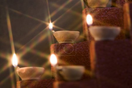 Diwali greeting card design divas oil lamps pantis