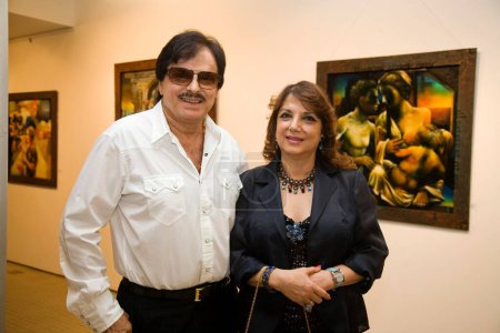 Photo for Bollywood film star Sanjay Khan with wife Zarine Khan at museum gallery kala ghoda art show - Royalty Free Image