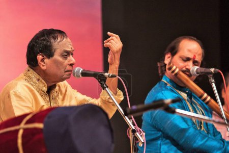 Photo for Indian Carnatic vocalist M Balamuralikrishna and flautist Ronu Majumdar performing, Mumbai, Maharashtra, India - Royalty Free Image