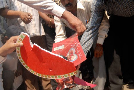 Photo for Protester burning valentine day greeting cards at, Mulund, Bombay, Mumbai, Maharashtra, India - Royalty Free Image