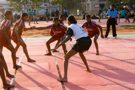 Photo for Women playing kabaddi on ground, Tamil Nadu, India - Royalty Free Image