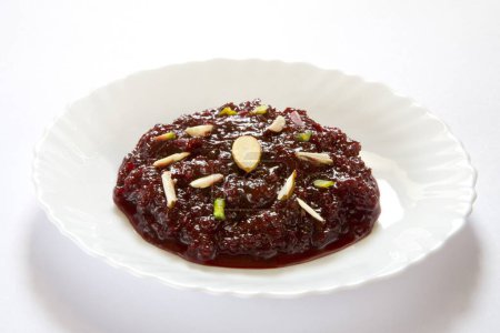 Comida india; postre dulce chukandar lal salgum ka halwa verduras remolacha dulce avena