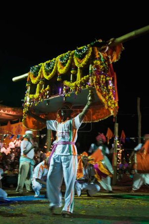Photo for Palki Dance holi festival Sadvali Devrukh Konkan Maharashtra India South East Asia - Royalty Free Image