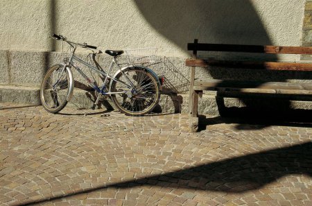 Photo for Bicycle at wall, Zermatt; Switzerland - Royalty Free Image