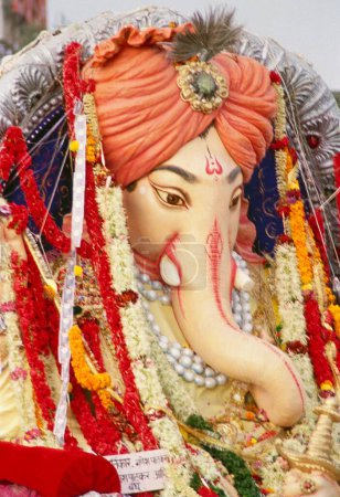 Ganesh ganpati Festival ; Procession of huge idol of Elephant headed God ; Mumbai Bombay ; Maharashtra ; India