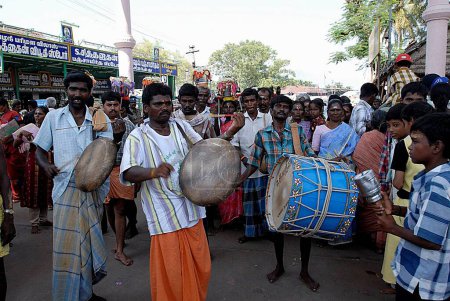 Photo for Theertha Kavadi, Agni Nakshatram is a 14-day hottest part of the year, at Kodumudi ardent devotees collect River Cauvery water in kavadis to Palani for abhishekam of the deity, majestic procession round giri vidhi Palani, Tamil Nadu, India - Royalty Free Image