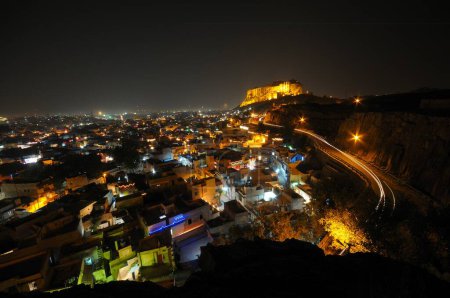 Photo for Mehrangarh fort in different color lighting and old city in night view , Jodhpur , Rajasthan , India - Royalty Free Image