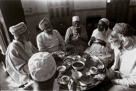 Photo for M F Hussain with friends taking annual eid lunch badar bagh mumbai Maharashtra India Asia - Royalty Free Image