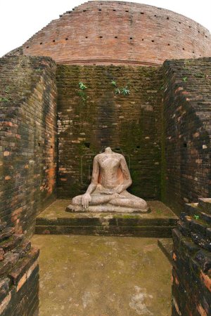 Photo for Statue of lord Buddha ; Buddhist site stupa is 1400 feet-edge & 51 feet-high ; Kesariya ; Bihar ; India - Royalty Free Image