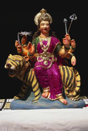 Photo for Idol of Goddess Durga seated on tiger procession , mumbai bombay , maharashtra , india - Royalty Free Image