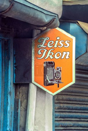Photo for Zeiss Ikon camera vintage vitreous enamel advertising sign board, India, Asia - Royalty Free Image