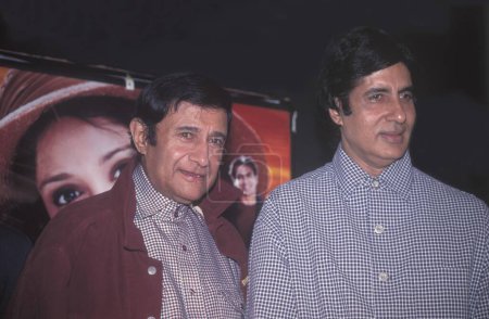 Photo for South Asian, Indian Bollywood Film Star Actor Amitabh Bachchan with actor and director Dev Anand at a music release function for Navketan's Main Solah Baras Ki, India - Royalty Free Image