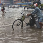 Monsoon havoc on street, India 