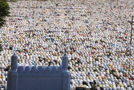 Photo for Crowd offering their Eid al Fitr or Ramzan id namaaz at Lashkar-e-Eidgaah ground, Malegaon, Maharashtra, India - Royalty Free Image