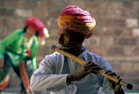 Photo for Rajasthani folk musician playing flute in jodhpur India - Royalty Free Image