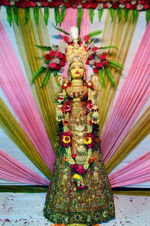 Idol of Gavar with heavy jewellery at Moti chowk on occasion of Dheenga Gavar festival Jodhpur Rajasthan India