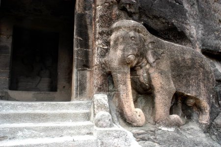Photo for A craving of an elephant at one of the gates leading inside the UNESCO World Heritage site  Ajanta Caves in Maharashtra ; India - Royalty Free Image