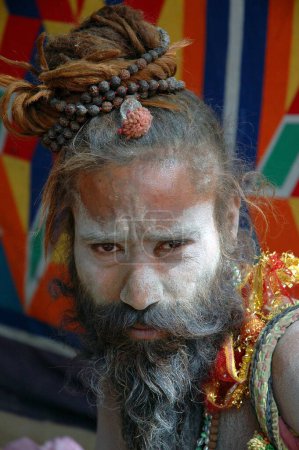Photo for Indian priest sadhu with beaded long hair black beard and ash on face, India - Royalty Free Image