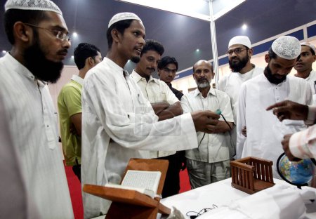 Photo for People attending International Islamic Conference and Exhibition held at Somaiya grounds in Bombay now Mumbai, Maharashtra, India - Royalty Free Image