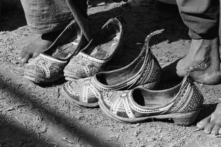 Photo for Men shoes mojdi of Kutch Vautha fair Gujarat India Asia 1983 - Royalty Free Image