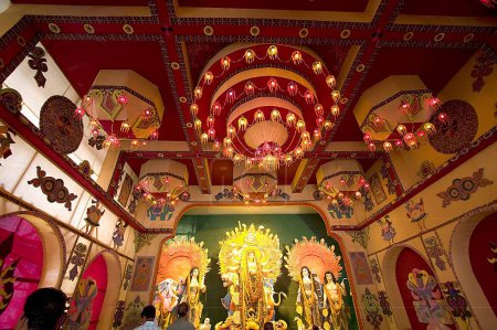 Photo for Decorated mandap and idols of goddess for Durga Puja, Kolkata, West Bengal, India - Royalty Free Image