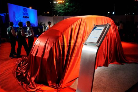 Photo for Tata Motor Tata Nano veiled prior to launch, Bombay Mumbai, Maharashtra, India - Royalty Free Image