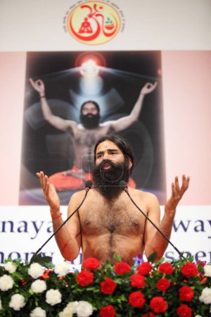 Photo for Yoga guru baba ramdev demonstrate pranayam techniques ; Bombay ; Mumbai ; Maharashtra ; India - Royalty Free Image