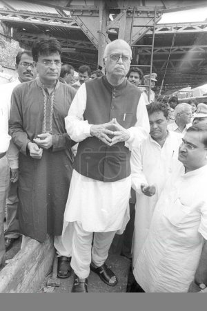 Photo for Bharatiya Janata Party leader Lal Krishna Advani visiting site of bomb blast at Mahim railway station, Bombay Mumbai, Maharashtra, India - Royalty Free Image