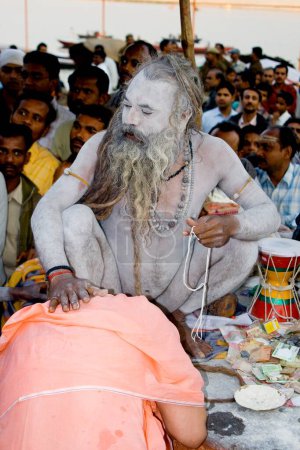Hindu saint naga baba Shivdasgiri in Varanasi on Ganga river ; Uttar Pradesh ; India MR707A
