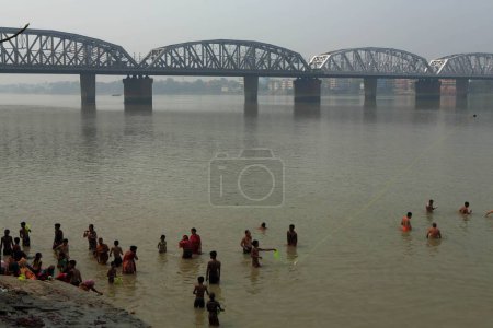 Photo for People bathing in hooghly river, kolkata, west bengal, india, asia - Royalty Free Image