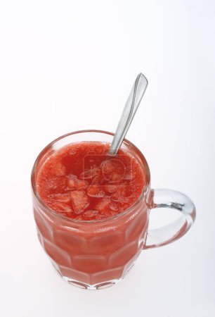 Fruits , Water Melon Latin Citrullus Lanatus juice in mug with a spoon