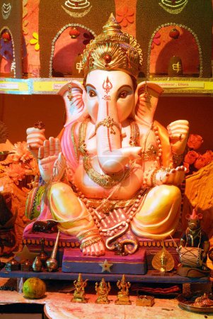 Photo for Richly decorated two idols of lord Ganesh elephant headed God ; Ganapati festival year 2008 at Pune ; Maharashtra ; India - Royalty Free Image