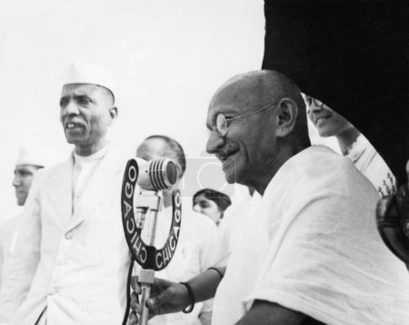 Photo for Mahatma Gandhi speaking into a mike at Pune, 1944 - Royalty Free Image