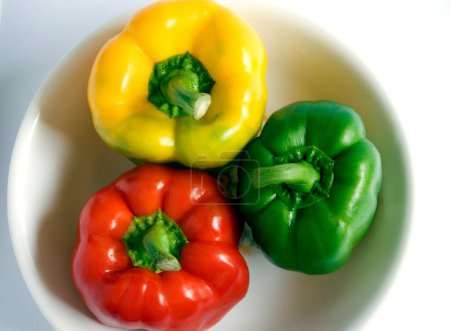 The Bell Peppers ; capsicums - red ; green & yellow originated from Mexico