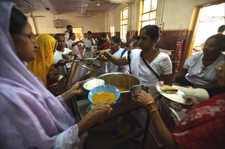 Photo for Food being served to victims of terrorist attack by Deccan Mujahedeen on 26th November 2008 treated in J.J. hospital in Bombay Mumbai, Maharashtra, India - Royalty Free Image