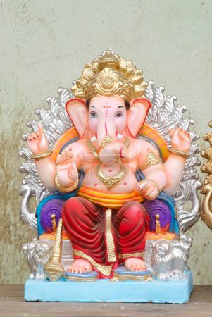Photo for Idol of lord Ganesh kept for sell ; Elephant headed god of Hindu ; Ganapati festival at Lalbaug ; Bombay Mumbai ; Maharashtra ; India - Royalty Free Image