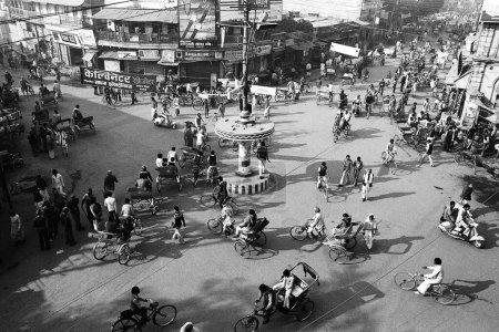 Photo for Chaos cycles rickshaws at city road intersection Varanasi Uttar Pradesh India 1982 - Royalty Free Image