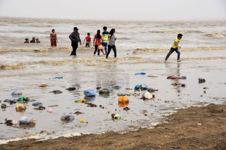 Photo for Garbage and tourists, Dumas beach, Surat, Gujarat, India, Asia - Royalty Free Image