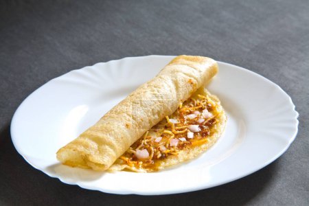 Photo for Fast food rawa masala dosa served in dish on grey background 19-May-2010 - Royalty Free Image