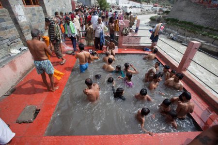 Photo for Devotees having hot water spring Uttarakhand India Asia - Royalty Free Image