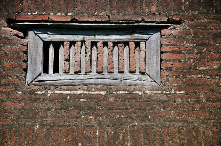 Photo for Wooden Window frame on Brick wall morgaon Maharashtra India Asia - Royalty Free Image