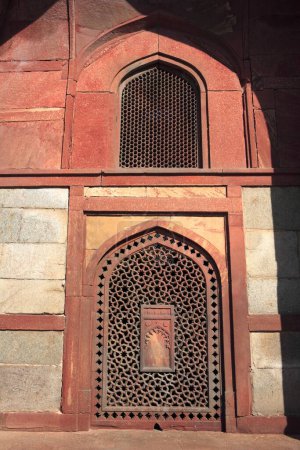 Photo for Jali of Barber's tomb in Humayun's tomb complex built in 1570 made from red sandstone mughal architecture , Delhi , India UNESCO World Heritage Site - Royalty Free Image