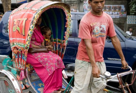 Photo for Street scene, Man riding cycle rickshaw, Dhaka, Bangladesh - Royalty Free Image
