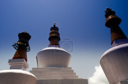Photo for Tops of three chortens , gangtok , Sikkim, india - Royalty Free Image