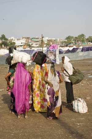 Photo for Pilgrims with luggage bag, ujjain, madhya pradesh, india, asia - Royalty Free Image